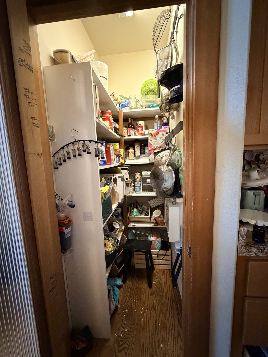 The same pantry full, seen from the doorway.